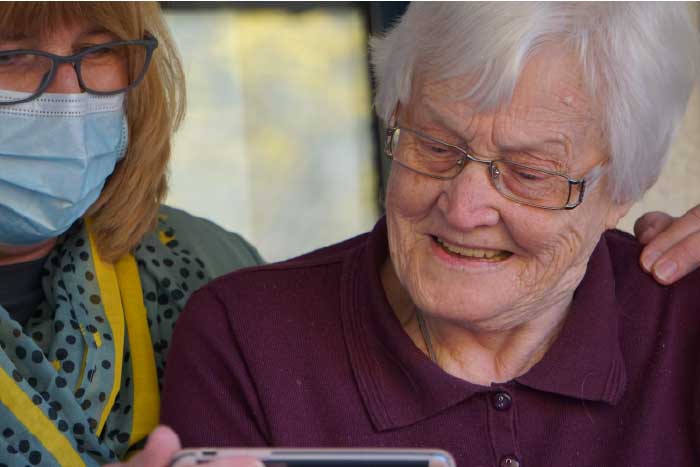 Everyday Home Care caregiver helping a senior at their home